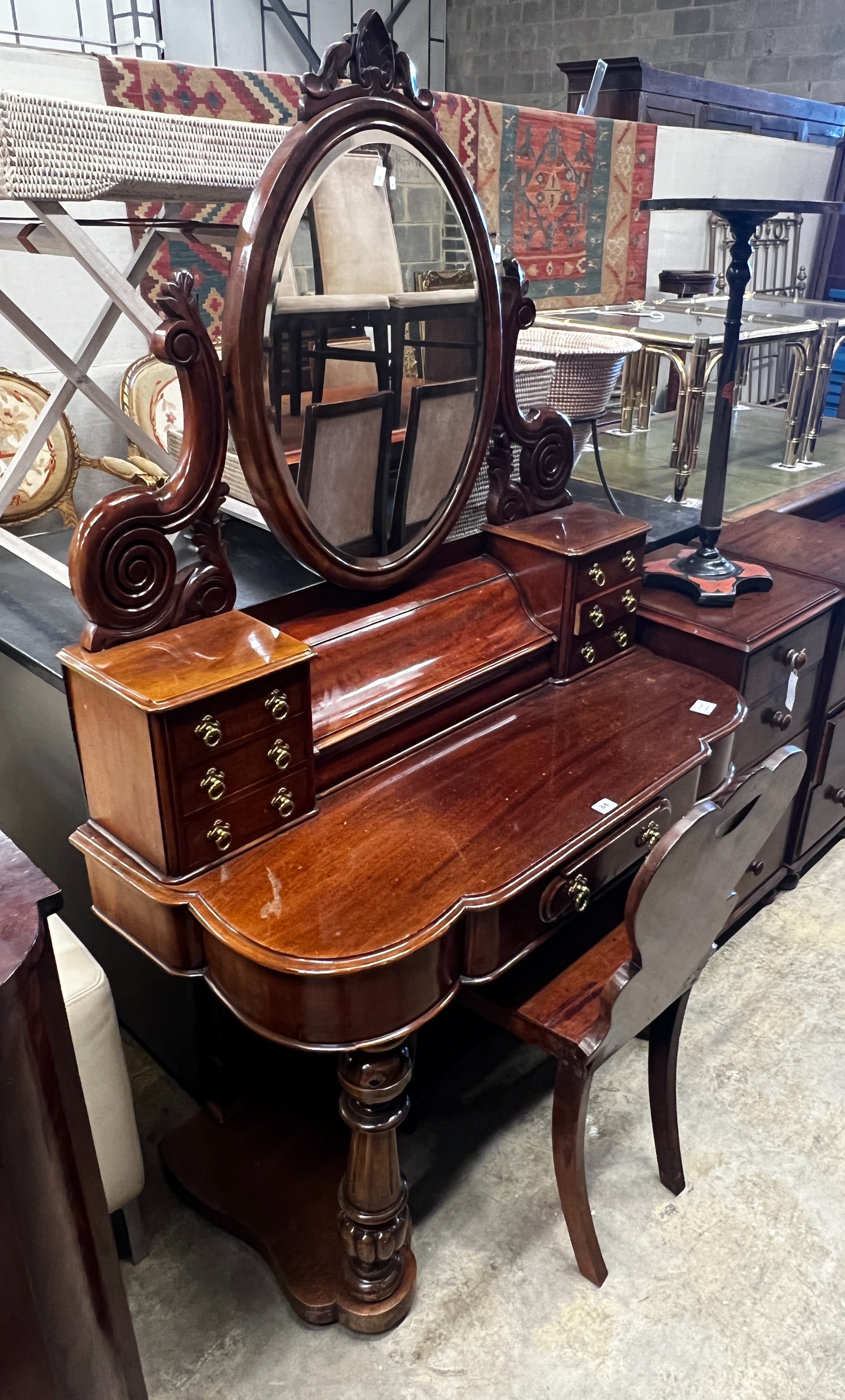 A Victorian mahogany duchesse dressing table, width 104cm, depth 48cm, height 164cm together with a mahogany hall chair